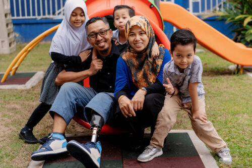 Amputee with Family Muslim